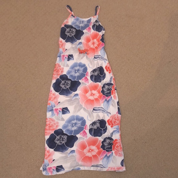 This is a floral dress in the size 5/6! It’s in white,blue,pink,and dark blue! - Picture 1 of 2